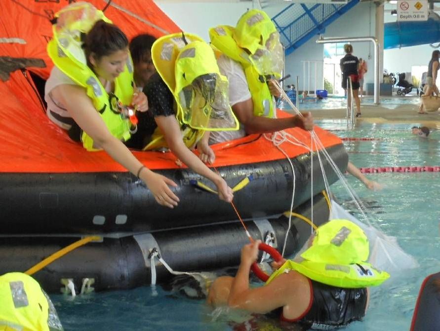 liferaft in pool on RYA sea survival course